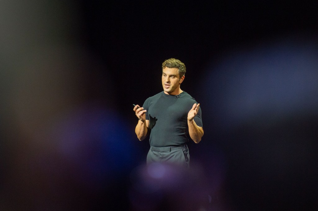 13 May 2025, USA, Los Angeles: Airbnb CEO Brian Chesky speaks at an event organized by the accommodation platform. Airbnb is focusing more on additional services and experiential excursions. Photo: Andrej Sokolow/dpa (Photo by Andrej Sokolow/picture alliance via Getty Images)