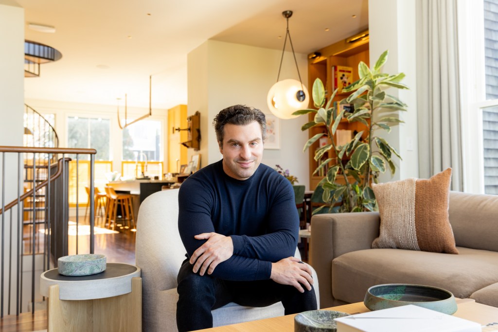 Brian Chesky, chief executive officer of Airbnb Inc., at his home in San Francisco, California, US, on Tuesday, Jan. 13, 2026. The company is investing to include more artificial intelligence and personalization elements into its service, with plans to launch AI search within the app in 2026 to help make better travel recommendations. Photographer: Jason Henry/Bloomberg