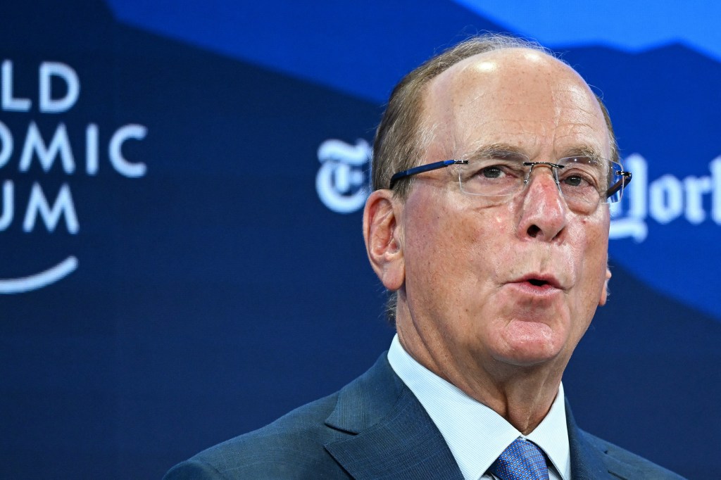 BlackRock chairman and WEF co-chairman Larry Fink speaks during the World Economic Forum (WEF) annual meeting in Davos on January 21, 2026. The World Economic Forum takes place in Davos from January 19 to January 23, 2026. (Photo by Fabrice COFFRINI / AFP)